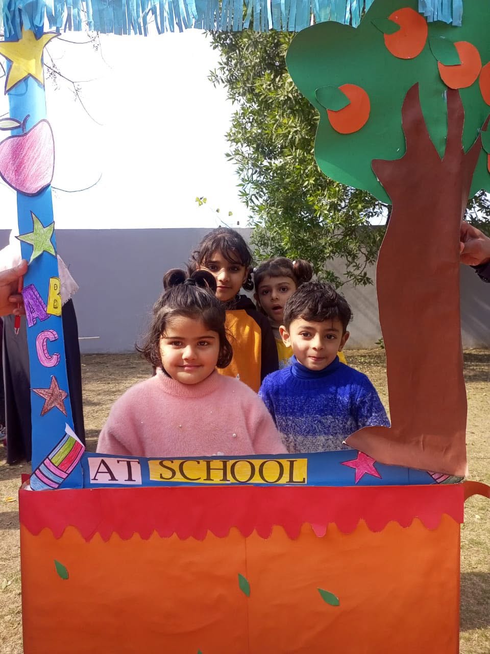 Royal School pupils at an Orange Day activity display